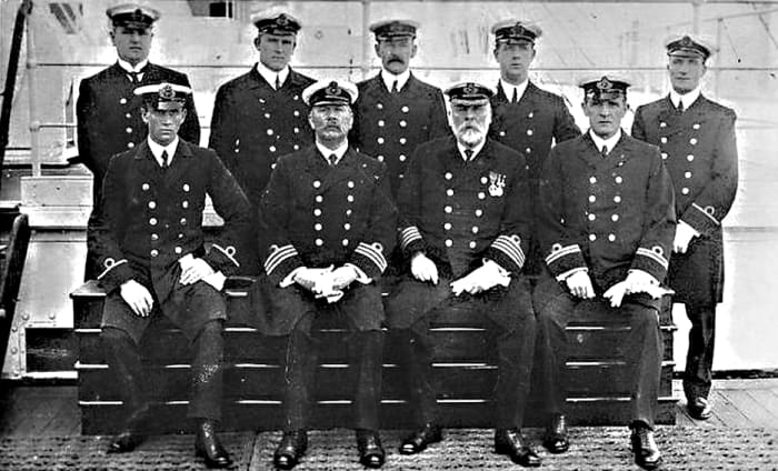 A full-bearded Captain Edward Smith with some of his crew. The Captain went down with his ship, and with the majority of the crew