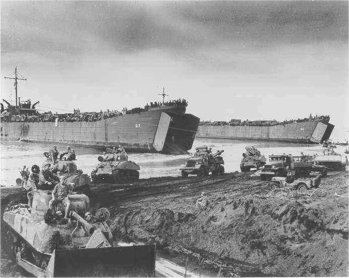WW2: Sherman tanks disembarking from an LST. LST stood for "Landing Ship, Tank"; their crews referred to them as "Long Slow Targets".
