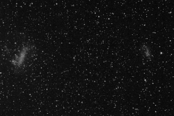 The Large Magellanic Cloud (left) and Small Magellanic Cloud (right). The bright 'star' to the right of the Small Cloud is actually 47 Tucanae, a globular cluster in our Galaxy