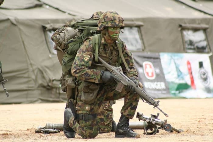 What's waiting for you while you're laughing at the Swiss Guard (Swiss Grenadier carring a Stgw 90 whilst taking part in the Swiss raid commando competition 2007.)
