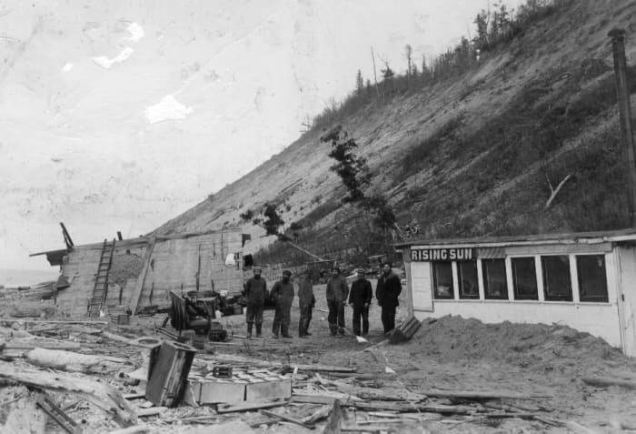 Men remained behind and were joined by others from Benton Harbor, Michigan to attempt to salvage the cargo of the boat.
