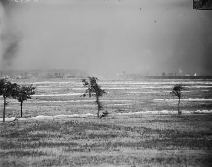 World War One: Photograph showing the British attacking the Hohenzollern Redoubt during the Battle of Loos. A cloud of smoke and gas appears in the centre and left.