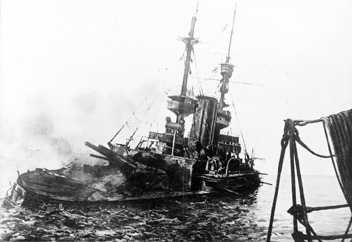 WWI: British battleship HMS Irresistible abandoned and sinking, 18 March 1915, during the Battle of Gallipoli.