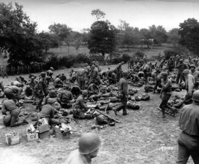 Group of replacements headed to 90th ID, July 1944. I can't imagine what they must have been thinking. The 90th had one of the highest casualties rates in the ETO. But I doubt they knew that.