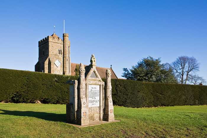Battle Abbey was built on the site of the battle by the Normans. In the foreground is a plaque dedicated to Harold, which incidentally was erected on the site where he supposedly fell.