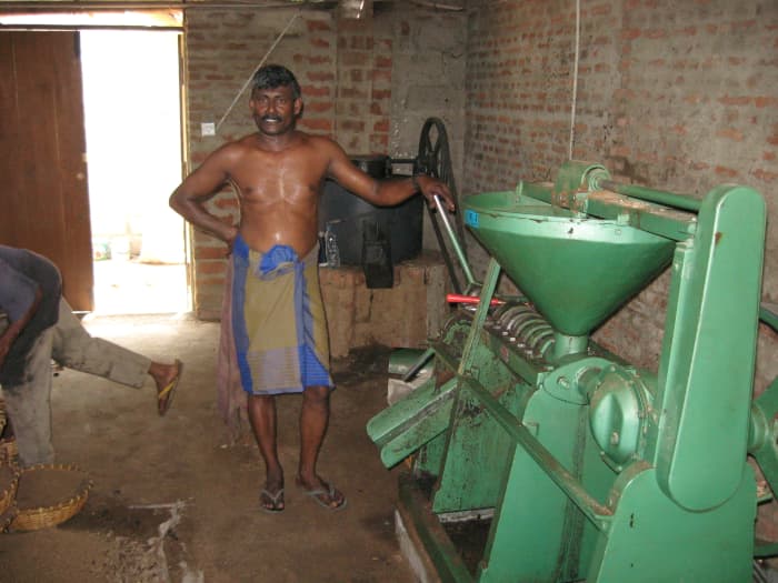 the last piece of machinery in the extraction process. The dried copra at the end is used as cattle fodder.