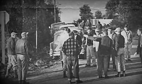 Searchers for little Ann Marie Burr gather in this photo from the front page of The Tacoma News Tribune.