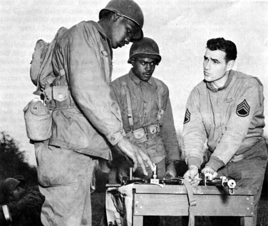 Infantry volunteers taking instruction in the use of small arms