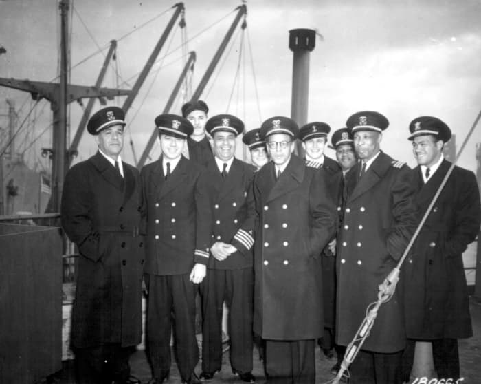 Captain Mulzac and his officers after arriving in England on the Booker T. Washington's maiden voyage