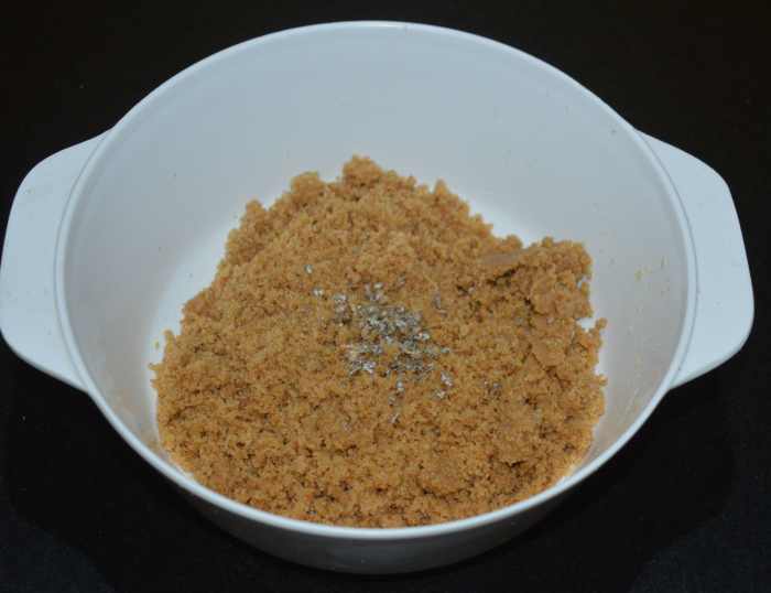 Collect the granules in a mixing bowl. Add crushed cardamom.