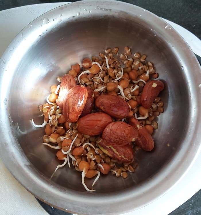 In a bowl, add sprouts. Wash and set aside. (I used chickpea and horse gram sprouts and some jackfruit seeds. You can use any sprouts of your choice or skip it altogether.)