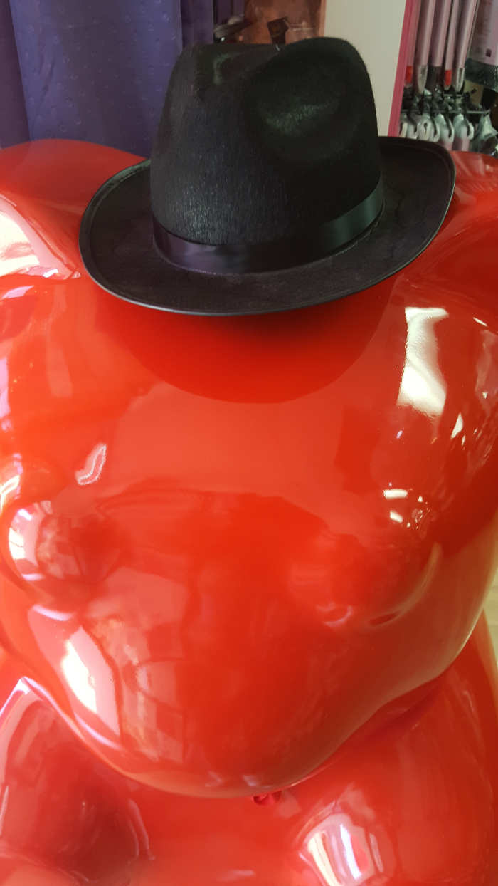 The suave red gummy bear who guards the entrance at Pure Delish.