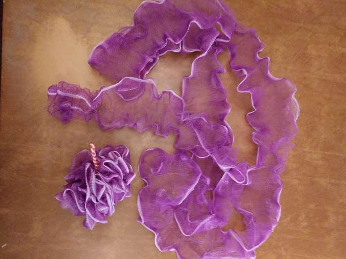 The shower balls, before and after the center cord is removed.