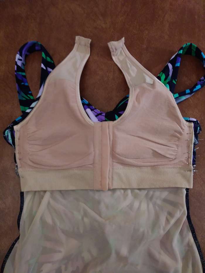 Match the seams of the comfort bra and the swimsuit. Pin them together.