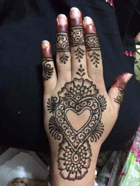 One of my friend's hands after I did their henna.