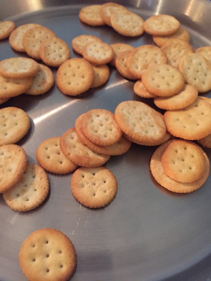 Though it may be tough to eat sometimes, you're worse off avoiding food altogether because an empty stomach promotes acid reflux, which only makes nausea worse—so give a light carb like saltines a shot!