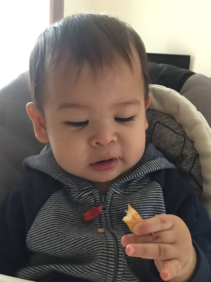 Babies love to eat peanut butter puffs. It is easy for them to hold the puffs, and it can help them improve their fine motor skills.