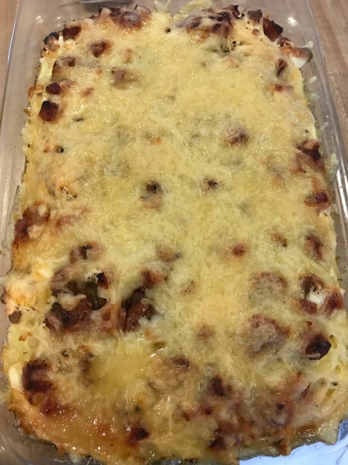 Bake the casserole for 45 minutes at 350°F. It will be golden brown on top and bubbly throughout. Let it rest for about 5 minutes before serving.