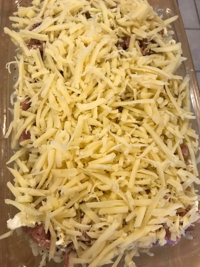 Top with the shredded Swiss cheese. Feel free to use whatever cheese you like: Monterrey Jack, cheddar or even Colby. But we like Swiss.