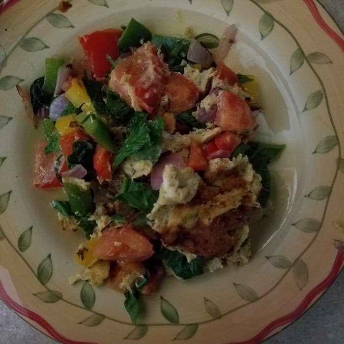 Come, sit down and eat with me. This delicious colorful garden veggie omelet is on the breakfast menu this morning. Bon Appetit!