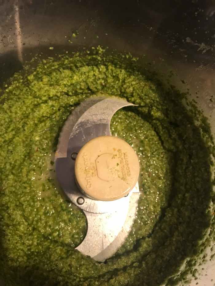 Step 2: Pulse ingredients until well blended and then drizzle in the olive oil. 