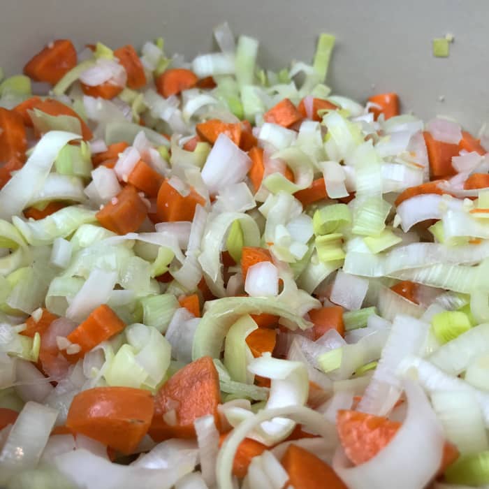 This is what the onions should look like when adding in the carrots. They should be starting to look translucent but still be a bit firm.