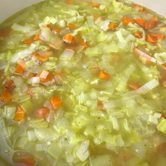 Be sure to set a timer for 9 minutes exactly! Any longer will overcook the orzo and it will begin to break down and overstarch the soup.