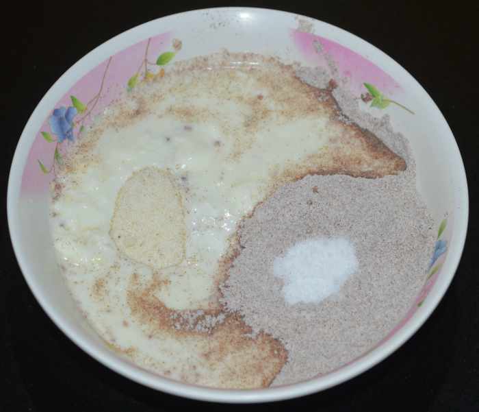 Step two: Add thick curd or yogurt and salt. Mix well.