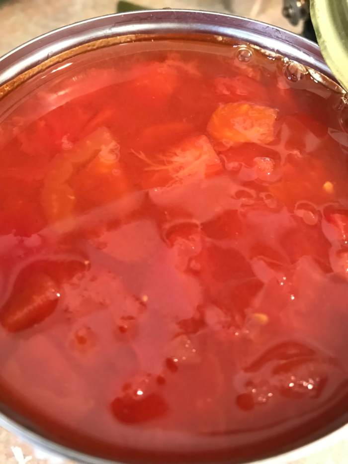 I use two types of tomatoes - both diced and crushed. I like the texture of the diced tomatoes, and the crushed tomatoes add their liquid to the broth for a fabulous soup.