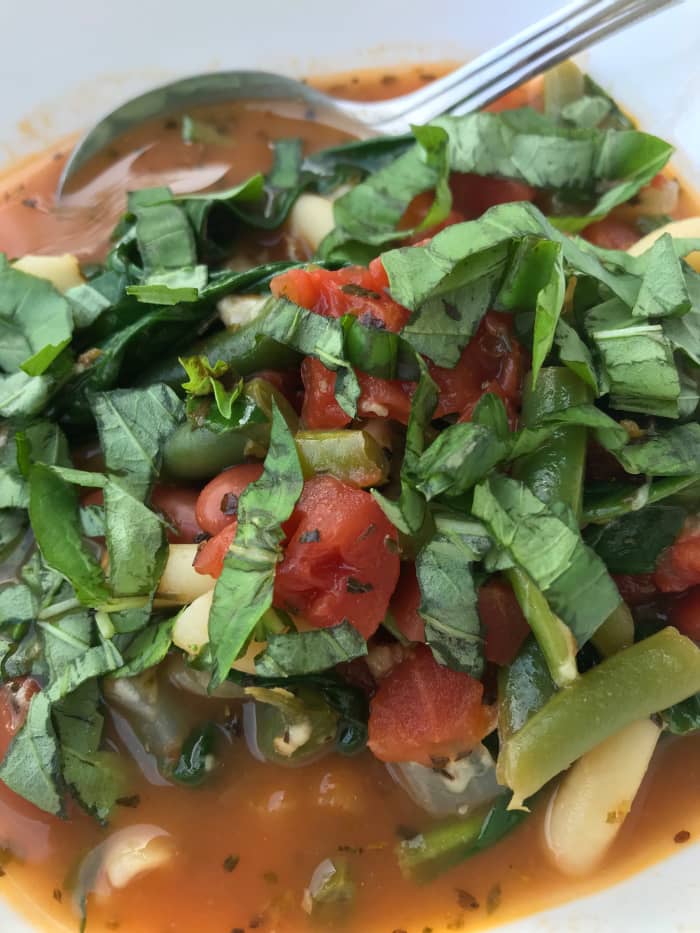 Fresh, homemade minestrone is rather simple—a delicious bowl of fresh vegetable soup. It's easier than it looks too—simmer the soup for just a few minutes and finish it with fresh herbs, and you'll have a true winner.