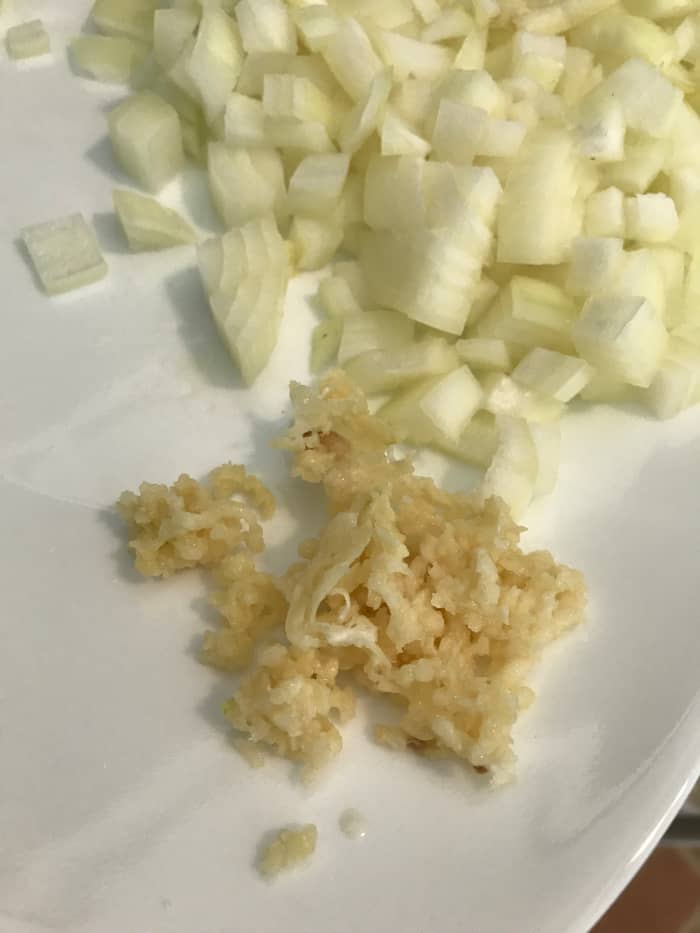 Diced onion and minced garlic are the first veggies for the pot. I like to dice finely, and mince or crush the garlic.