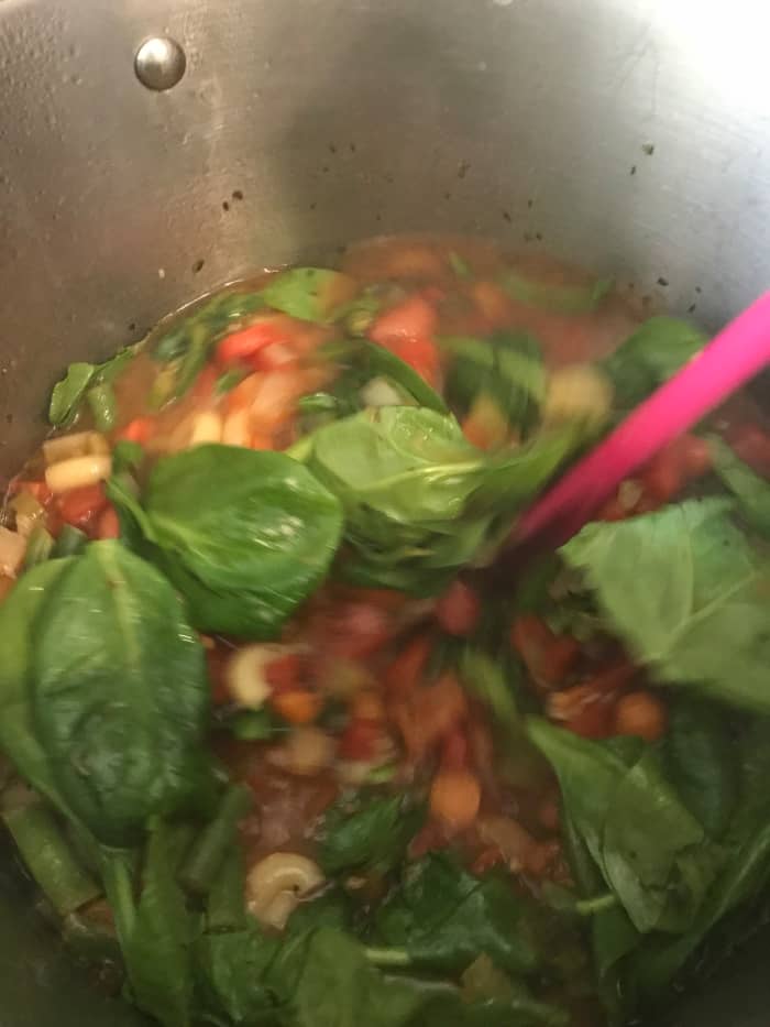 Stir in fresh spinach. By the time the spinach has wilted, it's perfect. It will retain it's fresh taste and texture in only minutes.