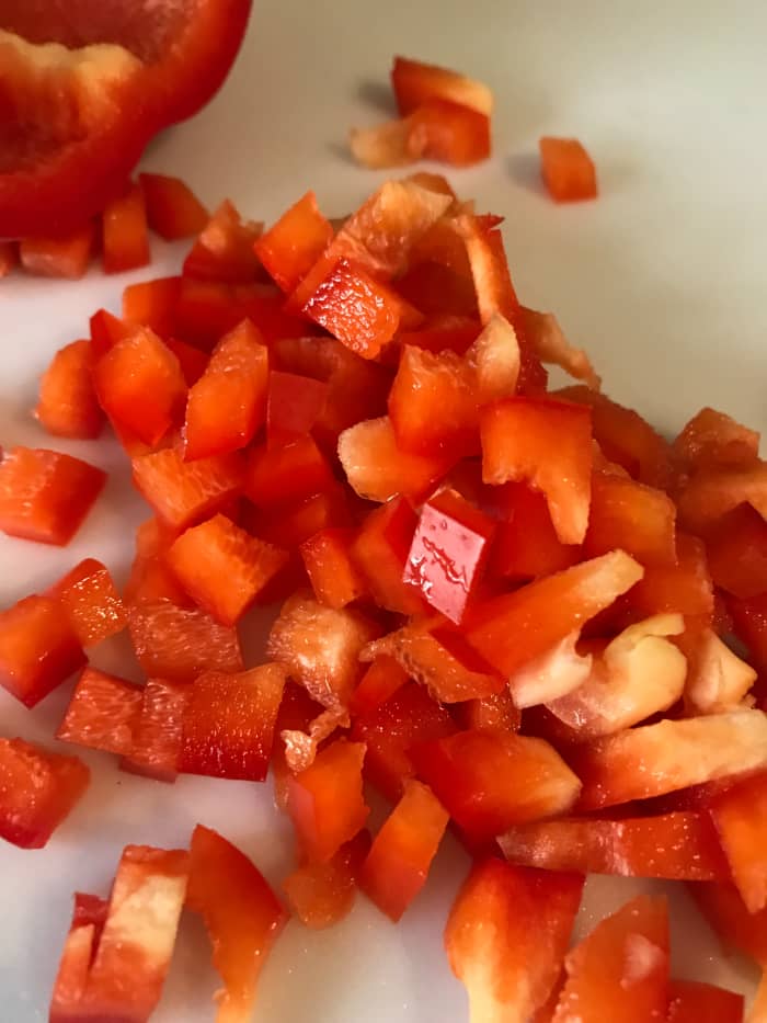 You can use any color of bell pepper you like - I like to go with red, orange or yellow both for their sweetness, and because it's harder to find those veggies in other places. The more color range, the more nutrition, so shake it up!