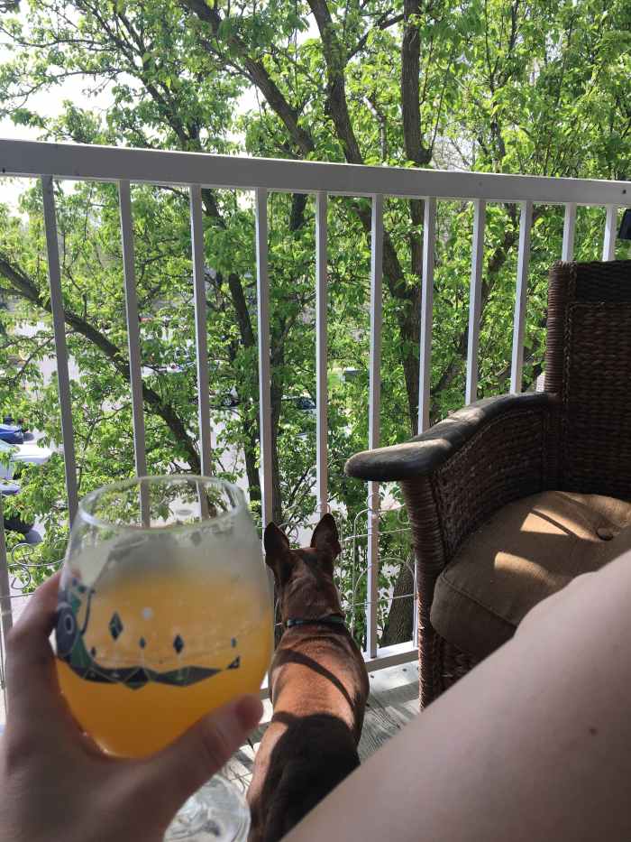 Enjoying the fresh air on my deck with a homemade orange crush.