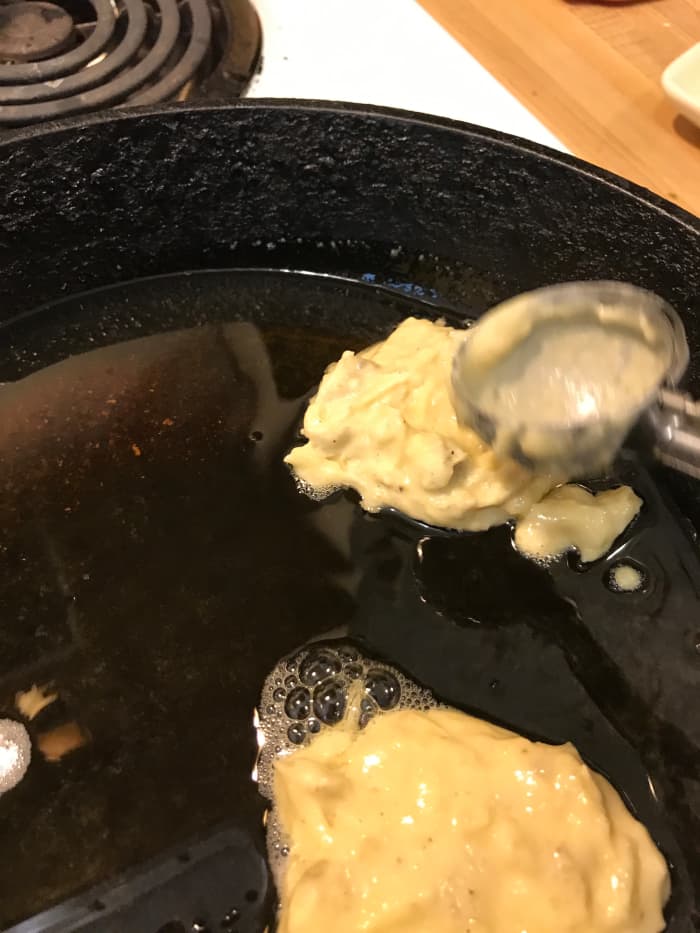 I like to use dishers to make sure my pancakes are all the same size, but you can make yours any size you like. Just flatten the pancakes a bit after you drop the batter into the hot oil.