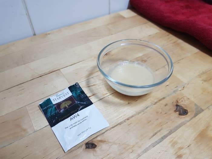Place yeast into a sanitized bowl with a small amount of water to hydrate while you complete the other steps.