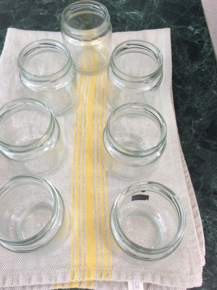 4. Ladle hot milk into control jar. Add gelatin and any flavoring you like into the rest of milk and simmer for 1 minute before ladling into the other jars.