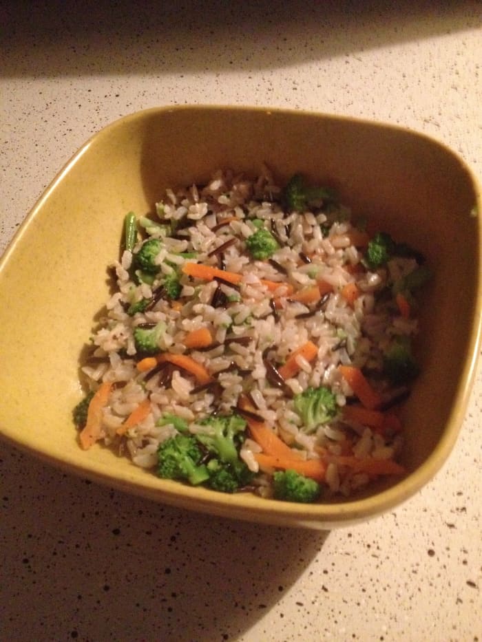 1st Layer: Brown Rice. *Note: I added leftover veggies to add color and flavor. The more vegetables, the more nutritional value, the better!