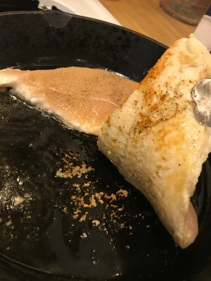After about 8 minutes, take a peek at the chicken. You want a nice golden crust, and the chicken should lift away from the skillet without sticking. This one is almost - but not quite - ready. It gets another couple of minutes.