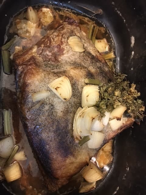 The roast is almost done, time to add the potatoes. See how many juices have come out of the roast at this point? That's perfect - and why you don't add any liquid at the beginning. There's no need! The brisket produces it's own.