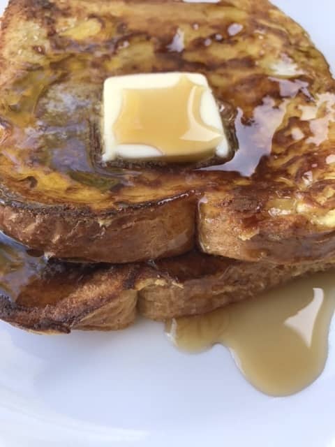 You can use any number of toppings for French Toast, both sweet and savory. My kids are classicists though, and a little butter and syrup are among their favorite ways to eat this comfort food.