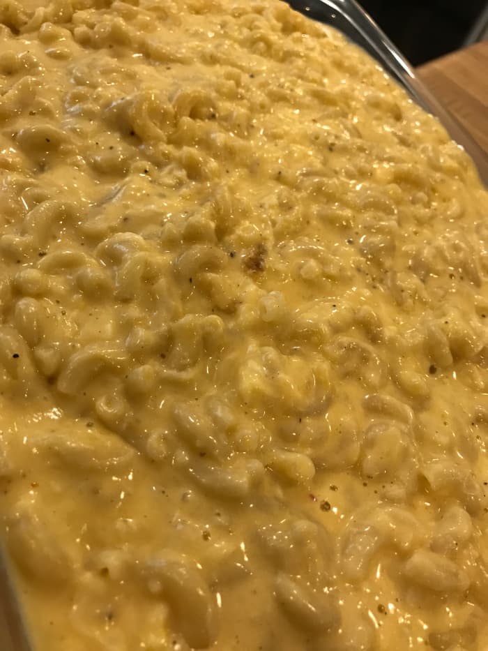 The macaroni and cheese will look pretty soupy before it goes in the oven. That's perfect - that's what you want. The sauce will tighten up as it bakes in the oven.