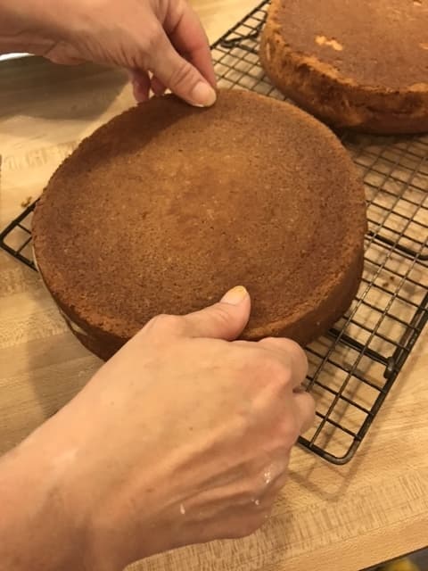 Once the bottoms have been spread with the lemon curd filling, replace the cake tops. Try to place them in the same direction as they were cut - this keeps the layers more even.