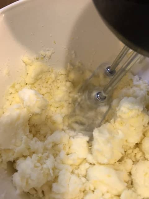 With the butter and sugar beaten well, add in the mixed dry ingredients. Mix until thoroughly combined, scraping down the sides of the bowl as you work.