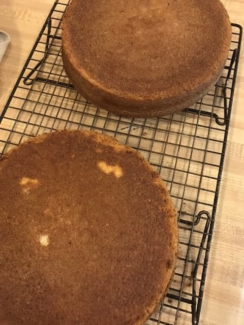 Cool the cakes in their pans for about ten minutes - this lets the cakes rest. Then invert them onto a wire rack and allow them to cool completely.