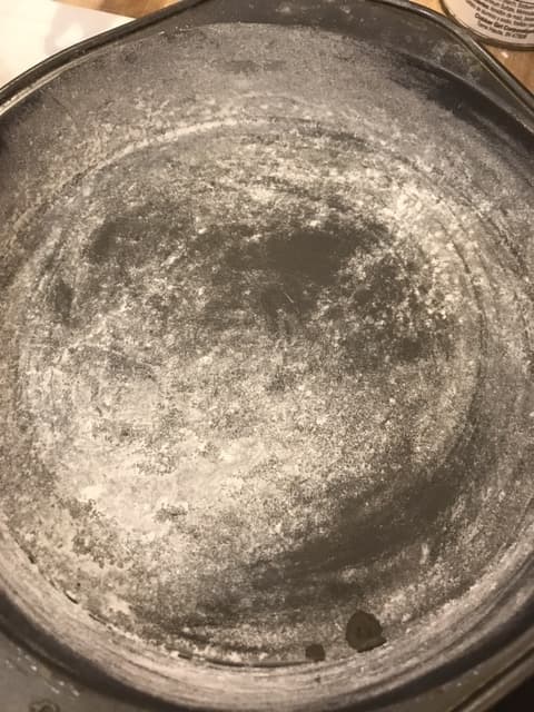 Take time to really get an even coating of butter on the cake pans, and tap out excess flour. This keeps the batter from sticking to the pans as the cakes bake.
