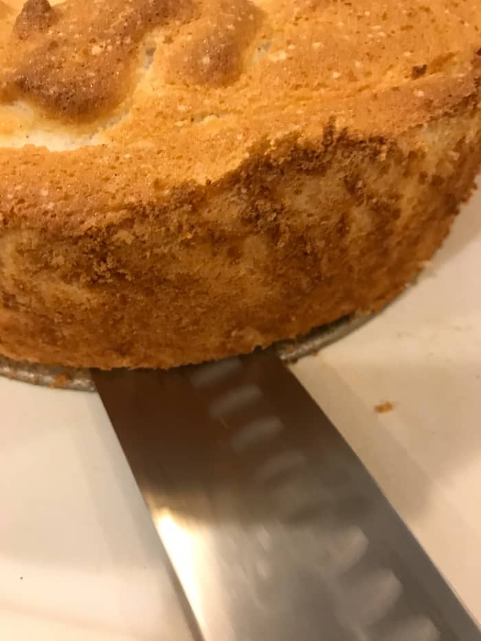 Once completely cool, use a knife to run around all the edges of the pan. Don't forget to run the knife around the inner tube. Once loose, simply transfer the cake to a serving plate - you're ready to go!