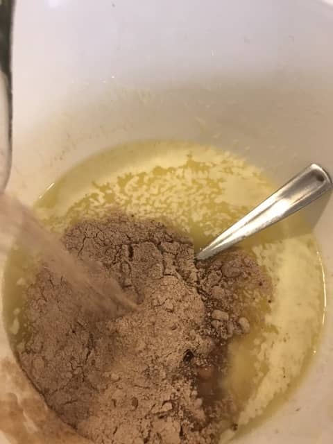 Stir the dry ingredients well, until they are fully incorporated. Then add the dry ingredients to the wet ingredients and stir well. Finish the batter with 1 cup of very hot water.