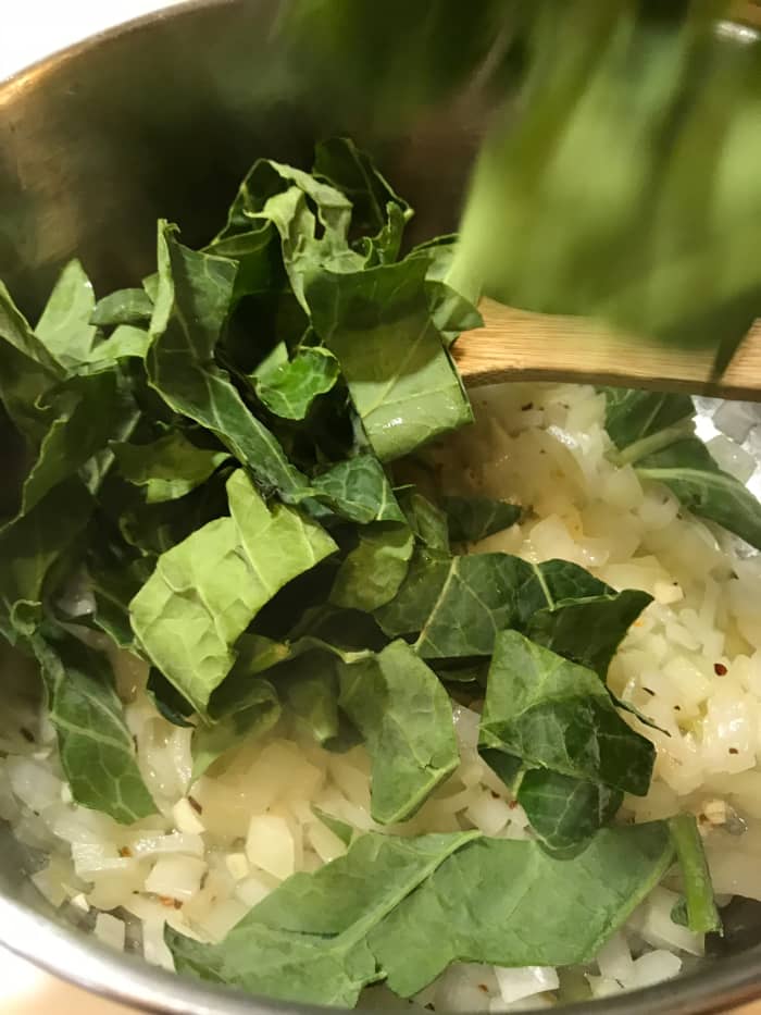 Because leafy greens can start out with such a large volume, you may need to add the greens in stages. Add a pot full, stir, wait a minute, then add more. They break down and wilt very quickly.