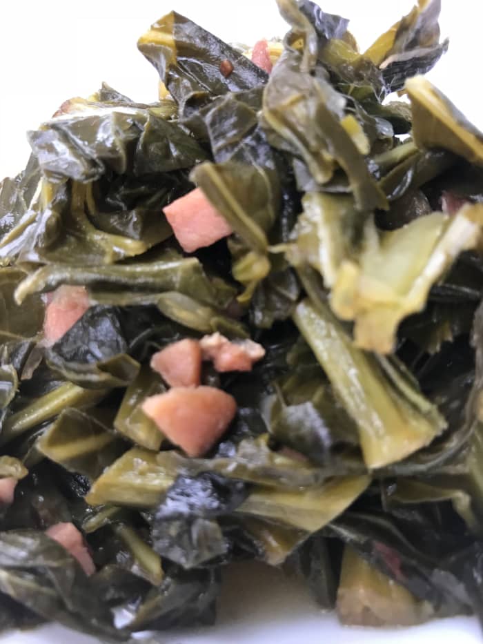 Rich and luscious, simple collard greens are simmered in broth with onions, garlic and apple cider vinegar for amazing results. A favorite comfort food in the South, they're also good luck when eaten on New Year's Day!